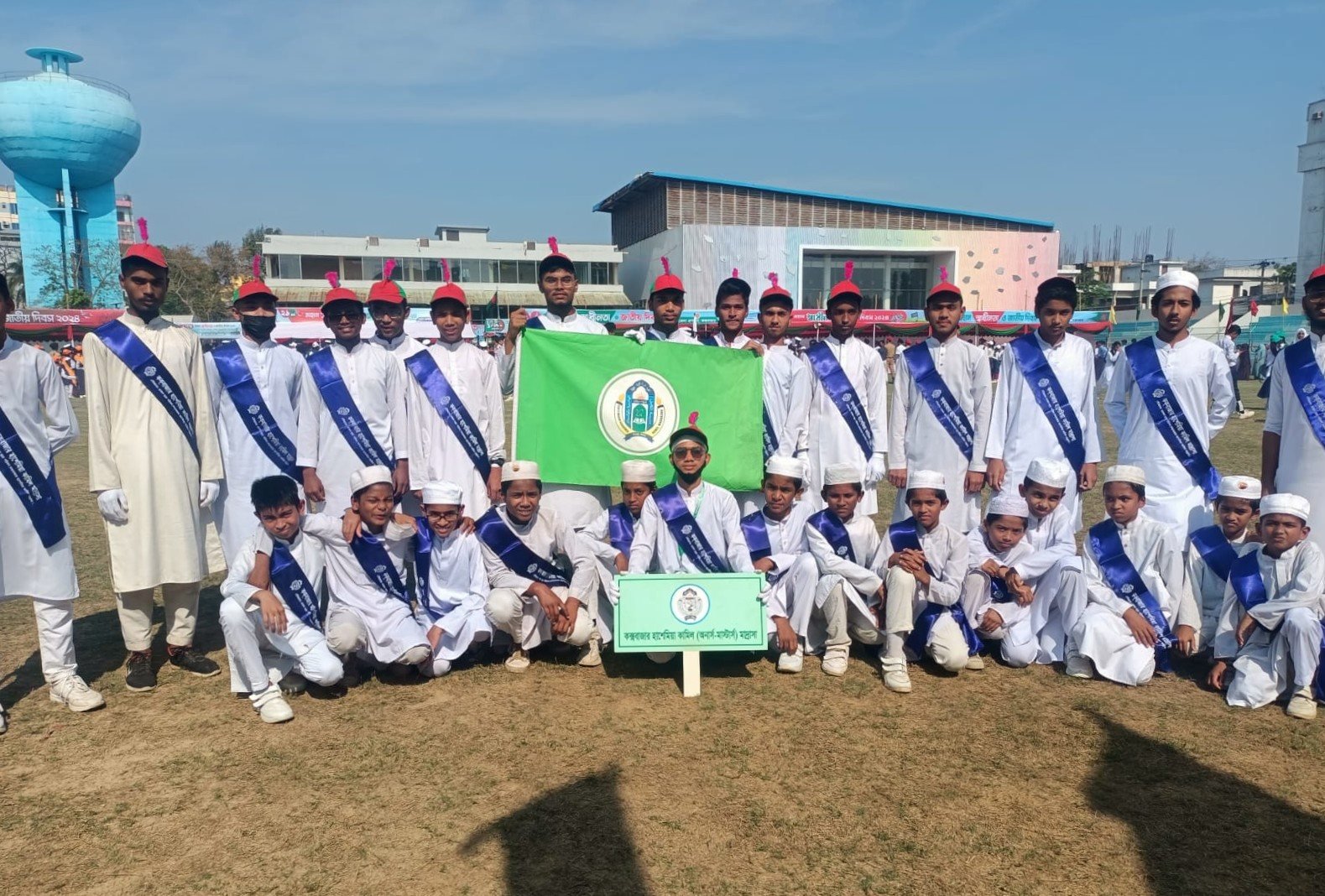 বিজয় দিবস কুজকাওয়াজে মাদ্রাসা শিক্ষার্থীরা।